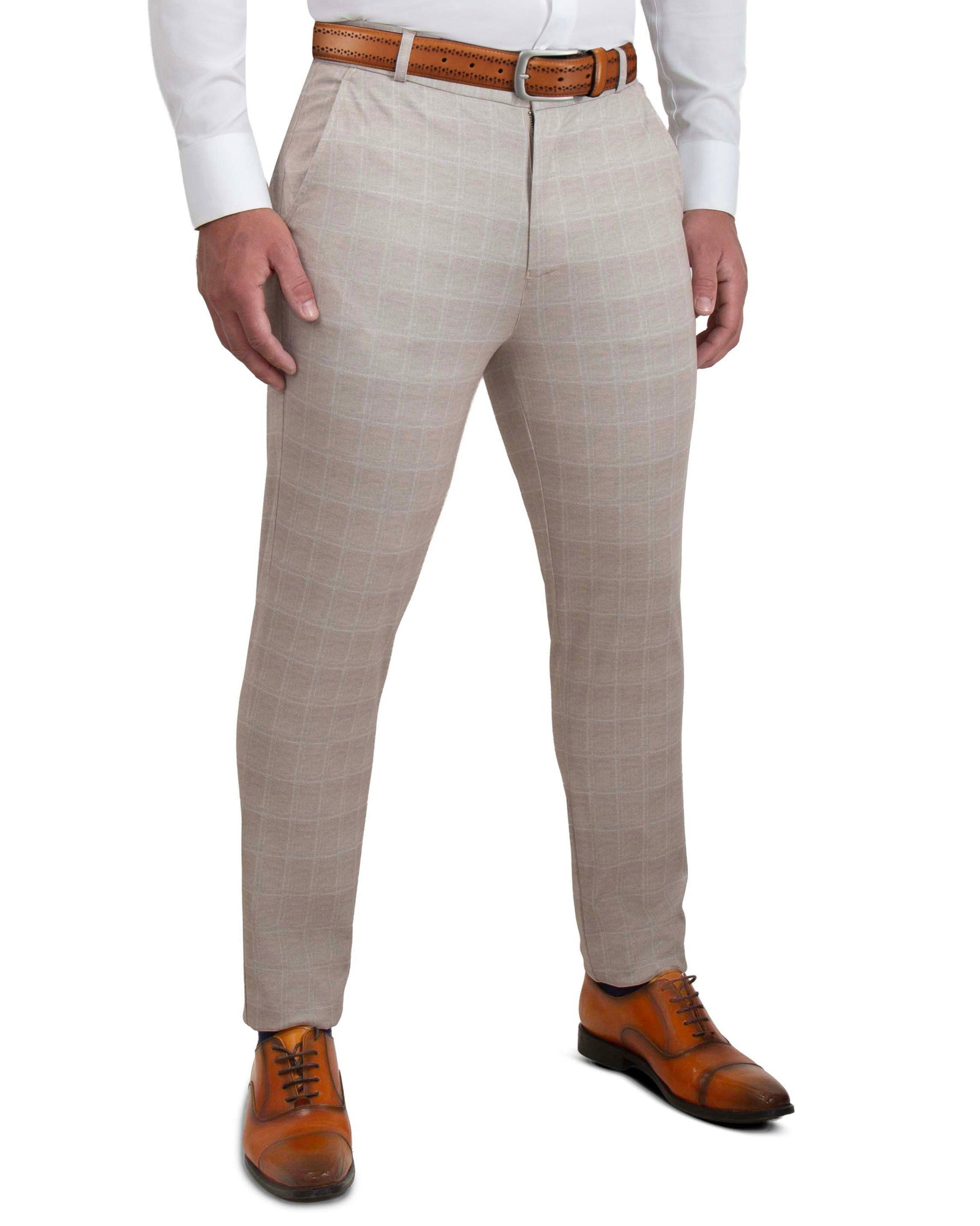 Beige checkered dress pants with a brown belt and shoes on a white background