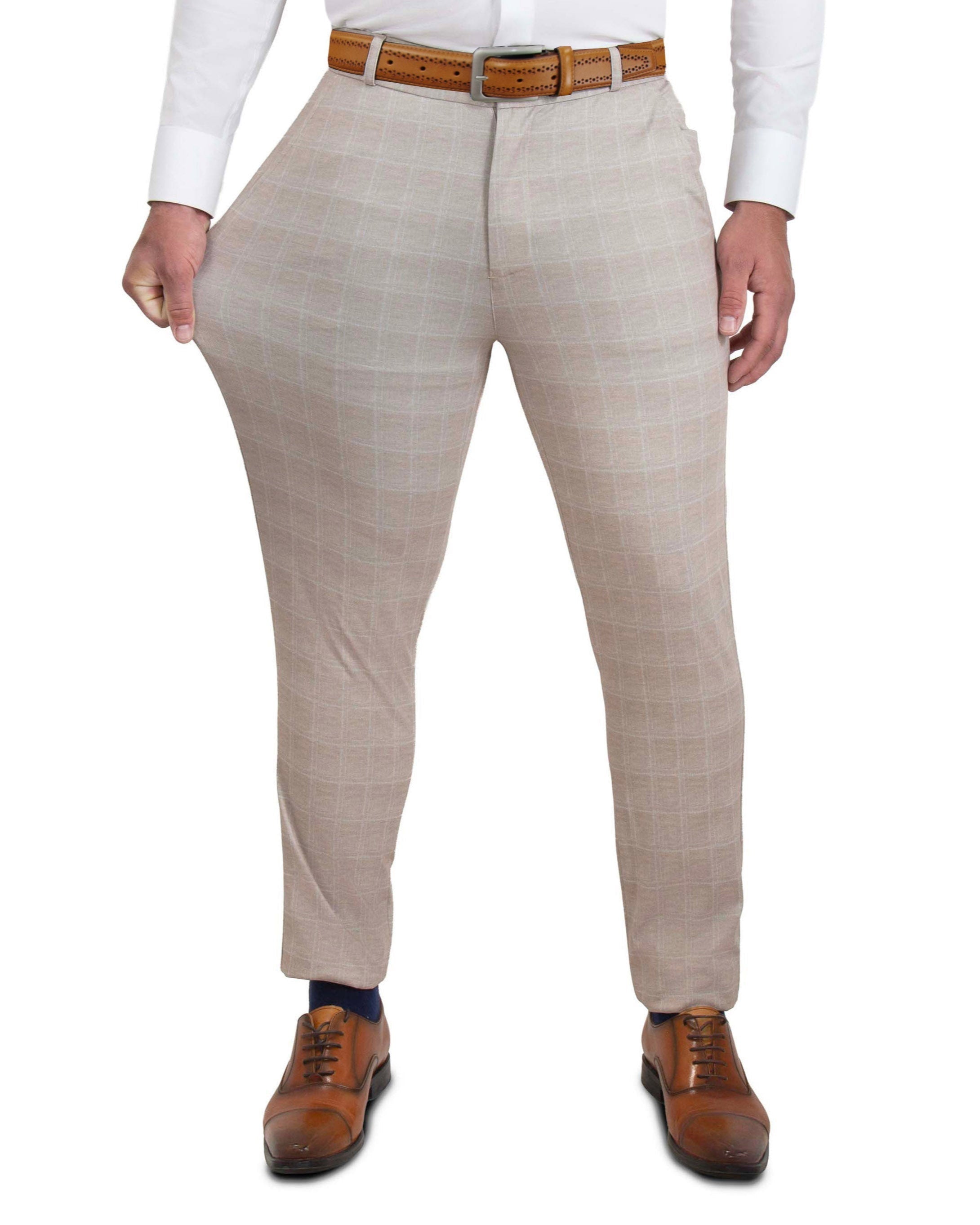 Beige checkered dress pants worn by a person on a white background