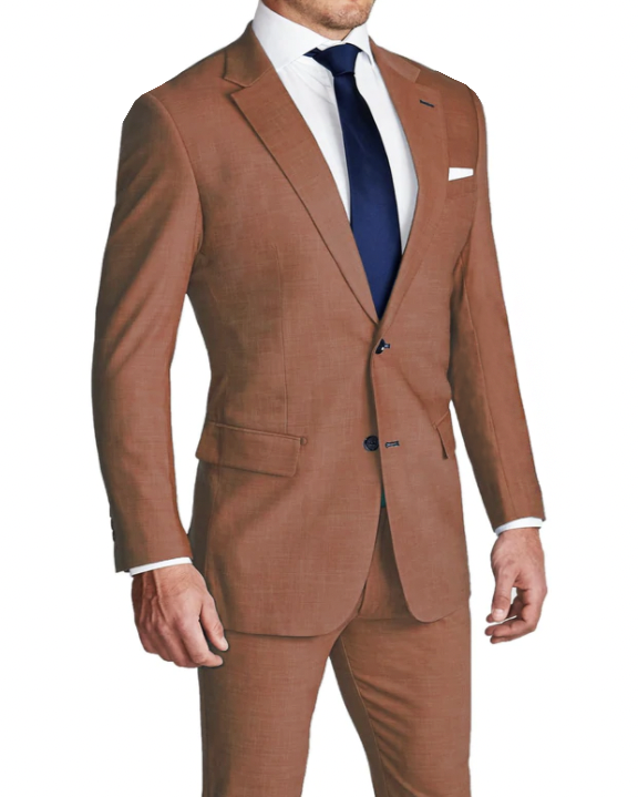 A man wearing a heathered copper colored athletic fit stretch suit with a white shirt and blue tie.