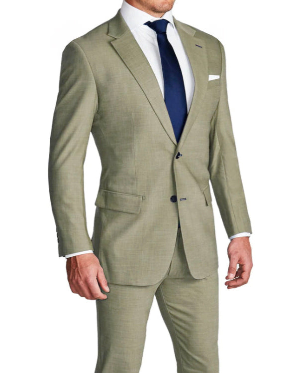 A man wearing a heathered olive green two-piece suit with a white shirt and blue tie.