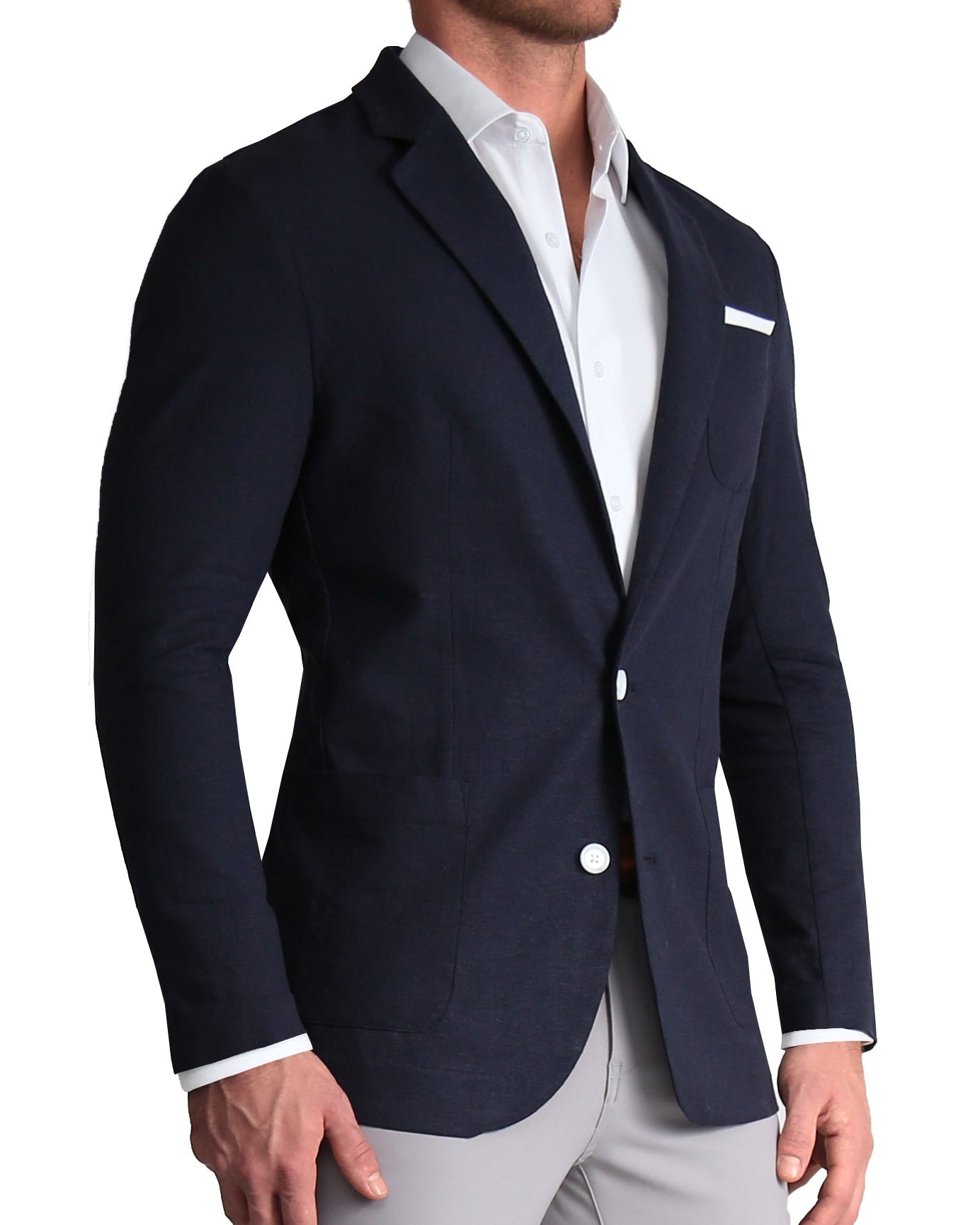 A navy unstructured linen blazer with two-button single-breasted design, medium notch lapels, and patch pockets. It is shown on a male model wearing a white shirt and gray trousers.